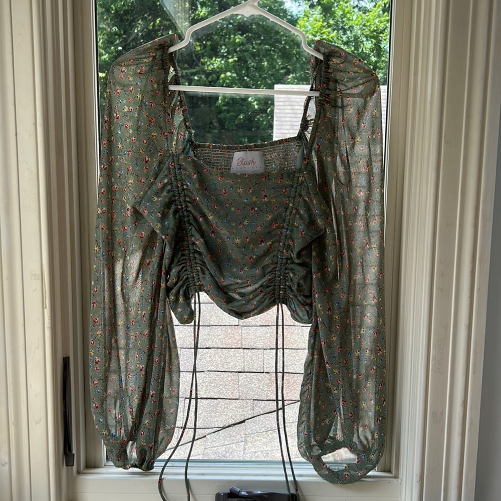 Sheer long sleeved green floral top
